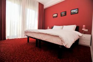 A bed or beds in a room at Piazza Four Colours