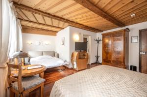 Postel nebo postele na pokoji v ubytování Hotel Rebstock