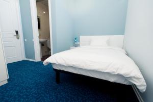 A bed or beds in a room at Piazza Four Colours