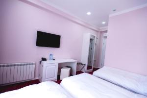 A bed or beds in a room at Piazza Four Colours