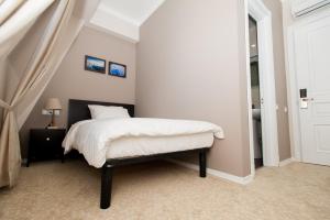 A bed or beds in a room at Piazza Four Colours