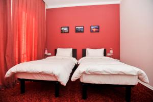 A bed or beds in a room at Piazza Four Colours