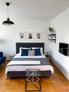 Posteľ alebo postele v izbe v ubytovaní Apartman Welcome to Trešnjevka
