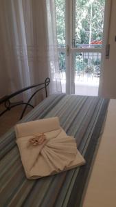 Postel nebo postele na pokoji v ubytování PONTE VALLE B&B POMPEI