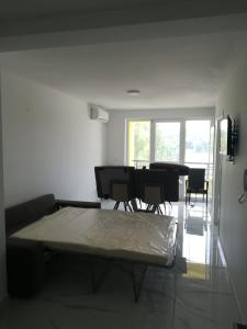 TV a/nebo společenská místnost v ubytování Venezia Apartman