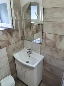 Koupelna v ubytování Zapp House