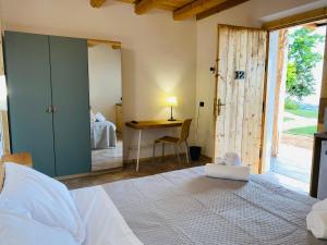 Posteľ alebo postele v izbe v ubytovaní Agriturismo La Perlara - Adults Only