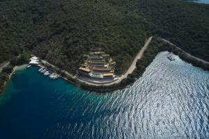 an aerial view of a large building in the water at Azur Retreat in Meganisi