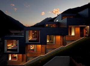 a house with a view of the night at Aradira in Kappl +36 photos