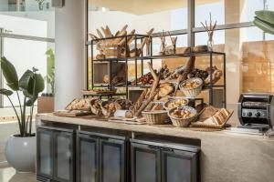 A kitchen or kitchenette at The G Hotel Seashell