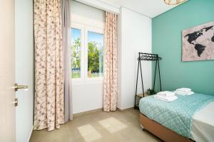 A bed or beds in a room at Villa Pines