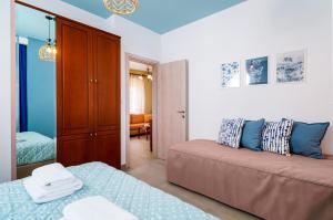 A bed or beds in a room at Villa Pines
