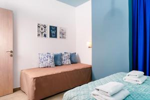 A bed or beds in a room at Villa Pines