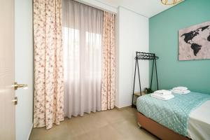 A bed or beds in a room at Villa Pines