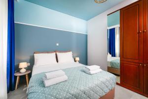 A bed or beds in a room at Villa Pines