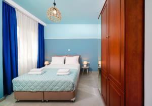 A bed or beds in a room at Villa Pines