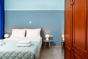 A bed or beds in a room at Villa Pines