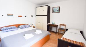 Postel nebo postele na pokoji v ubytování Apartment Murva