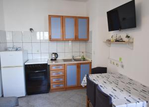 Kuchyň nebo kuchyňský kout v ubytování Apartment Murva