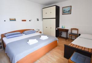 מיטה או מיטות בחדר ב-Apartment Murva