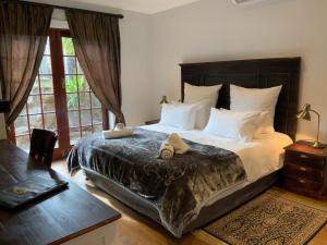 Ein Bett oder Betten in einem Zimmer der Unterkunft Goblin's Mead