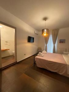 Cama o camas de una habitación en Relais Petruzzelli