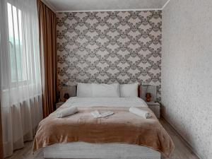Rúm í herbergi á Toliketi Kazbegi