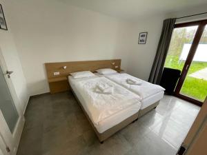 Letto o letti in una camera di Resort Nová Pec