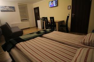 Posteľ alebo postele v izbe v ubytovaní Willa Beskidek PLUS