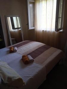 Posteľ alebo postele v izbe v ubytovaní Apartmani Ilena