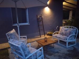 Posedenie v ubytovaní Apartmani Ilena