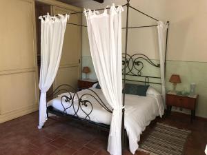 Postel nebo postele na pokoji v ubytování Cascina Bolichin