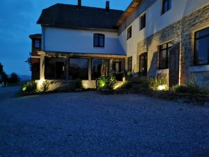 an image of a house at night at Sonnige Ferienwohnung Am Sternberg in Extertal