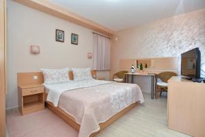 Photo de la galerie de l'établissement Apartments and Rooms Drago, à Sveti Stefan