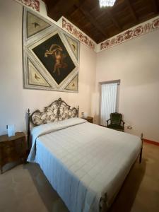 Posteľ alebo postele v izbe v ubytovaní Palazzo Forlani