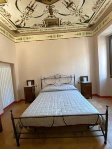 Posteľ alebo postele v izbe v ubytovaní Palazzo Forlani