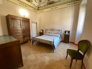 Posteľ alebo postele v izbe v ubytovaní Palazzo Forlani