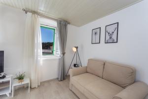 TV a/nebo společenská místnost v ubytování Apartment Petric, old town Hvar
