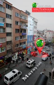 a city street with cars and a large balloon at Sulduz Hotel in Trabzon