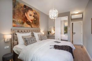 Posteľ alebo postele v izbe v ubytovaní Villa Buddha Bay