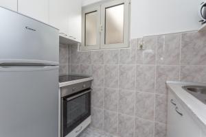 Kuchyň nebo kuchyňský kout v ubytování Apartment Petric, old town Hvar