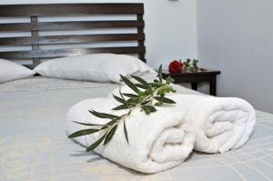 Letto o letti in una camera di Elea Apartments