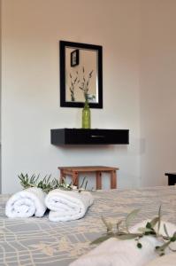 Letto o letti in una camera di Elea Apartments
