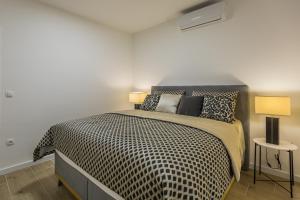 Ένα ή περισσότερα κρεβάτια σε δωμάτιο στο Luxury 2 bedroom apartment with sea view