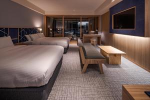 Postel nebo postele na pokoji v ubytování UNO HOTEL + 37 fotografií