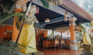 Restoran või mõni muu söögikoht majutusasutuses Ubud Hotel & Cottages