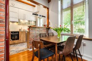 Η κουζίνα ή μικρή κουζίνα στο Apartamenty4you - SleepWell Apartment