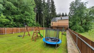 Vonkajšia záhrada v ubytovaní Lipno & Wellness Chata
