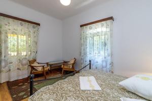 Postel nebo postele na pokoji v ubytování Apartments Štefi 869