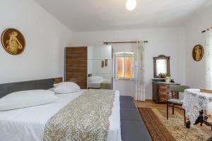Postel nebo postele na pokoji v ubytování Apartments Štefi 869